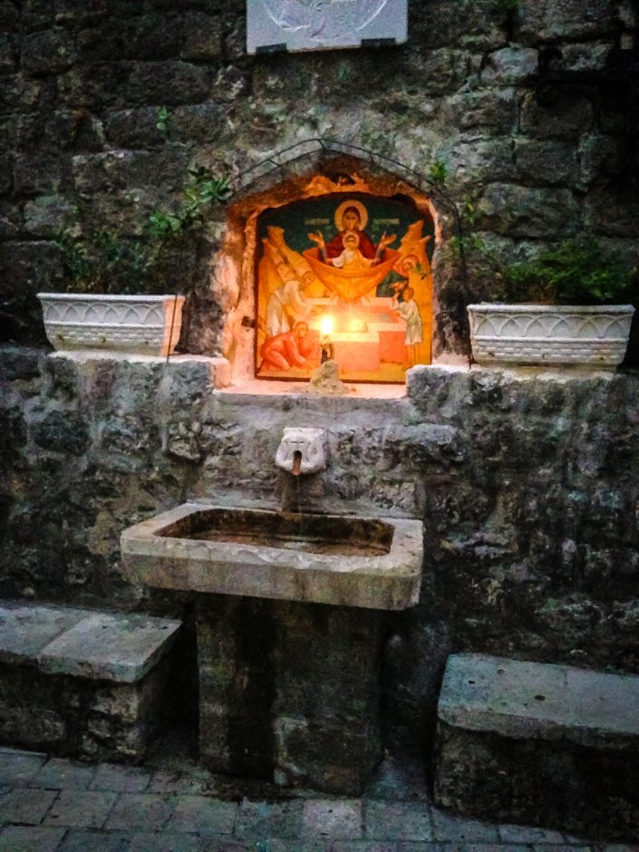 Icon and candle, Kotor, Montenegro